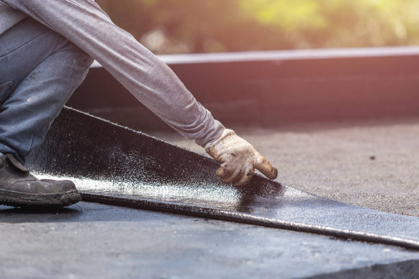 Professional Basement Waterproofing technician working in Butler, WI